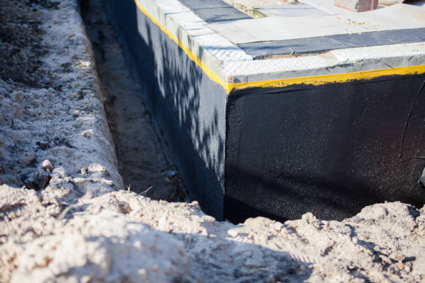 Professional Waterproofing technician working in Lewis Center, OH